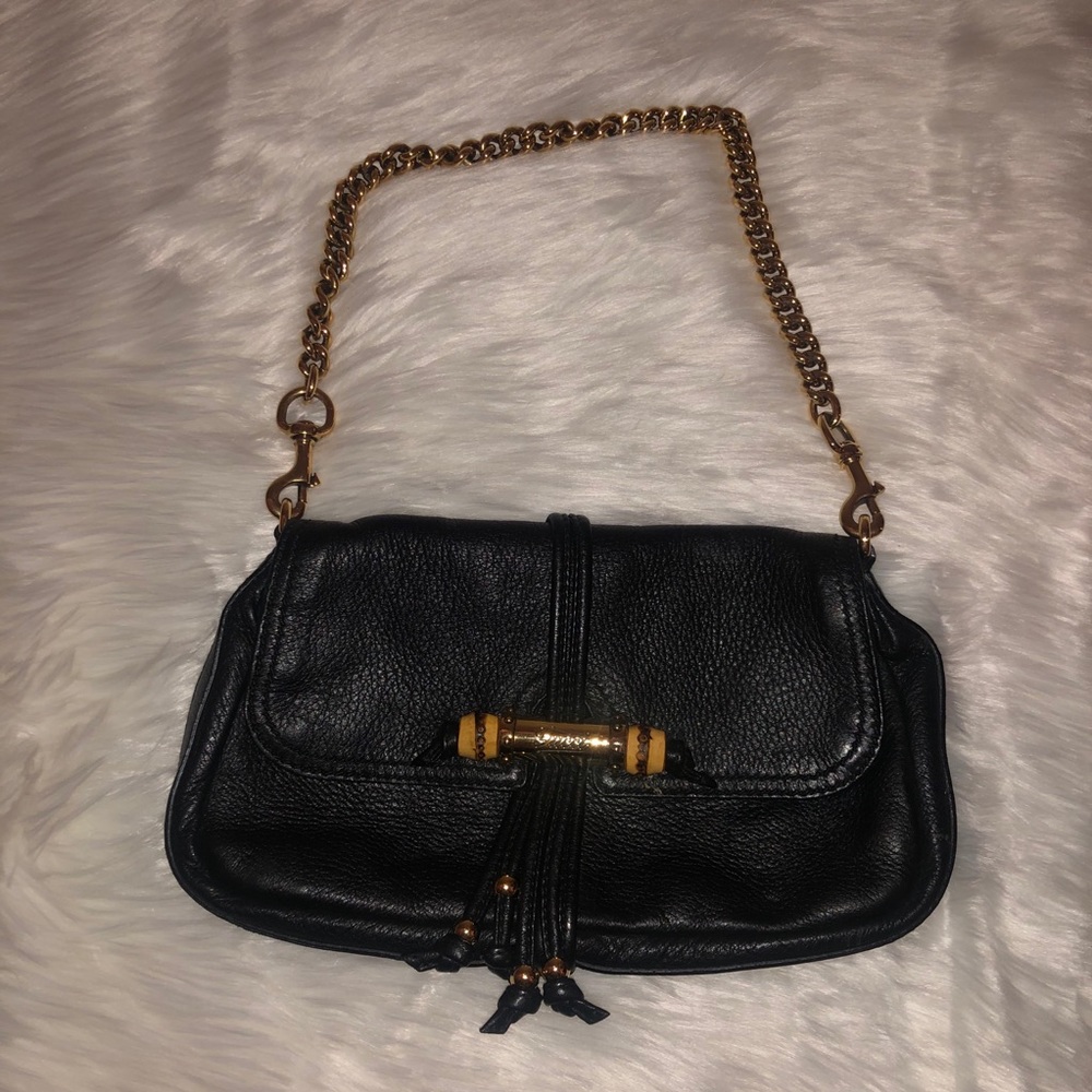GUCCI -100% Authentic Black and Gold leather Bag